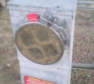Electric Meter Box:  notice the charing around the top of the meter socket, these four photos were taken with a low resolution camera RCA Camera, I tried my best to photograph it, it looks much worse if you go and look at it yourself.